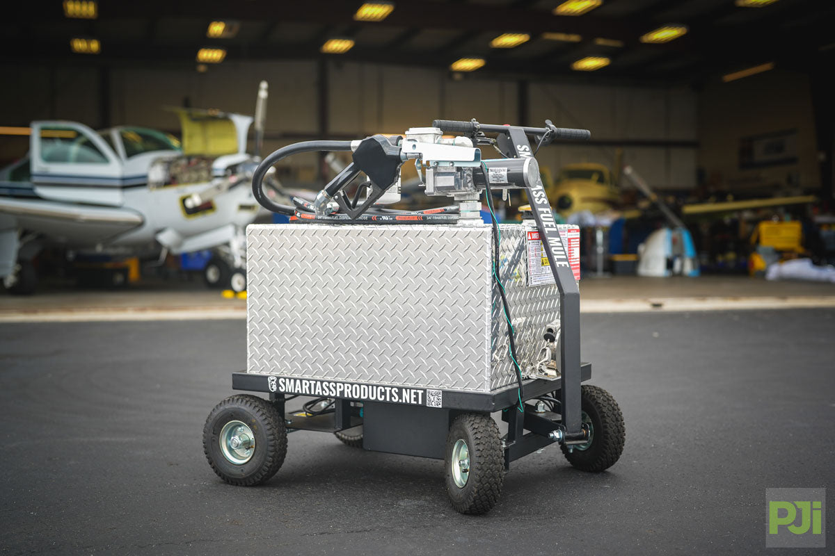 Smart Ass Fuel Mule Airplane Fueling Caddy in front of hangar