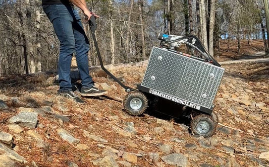 Mobile fuel storage system navigating rocky terrain for emergency fuel transport operations.