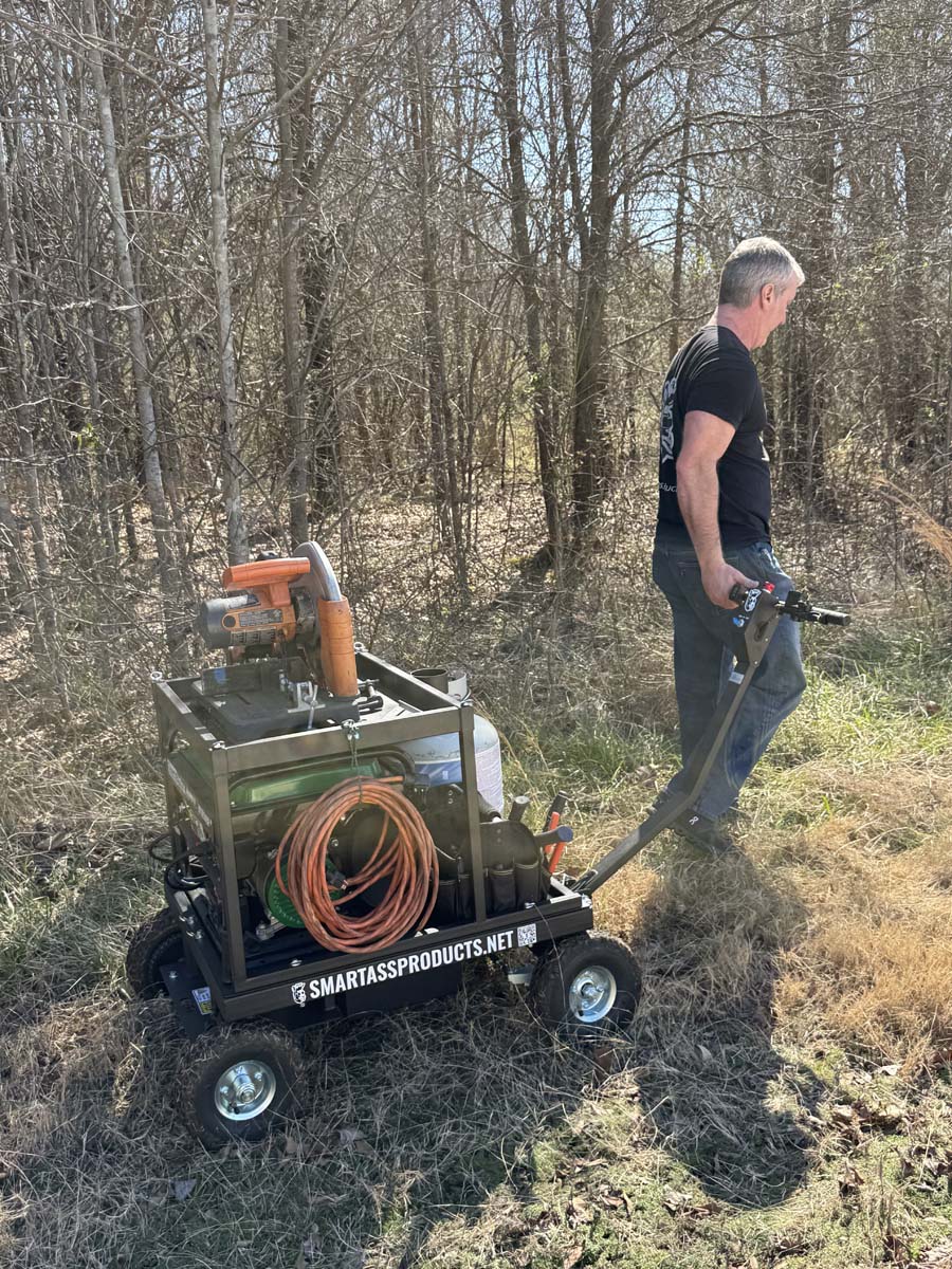 Just taking my motorized, generator powered, chopsaw workstation for a walk in the woods....